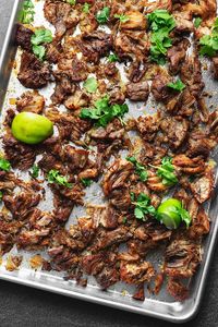 This Carnitas Recipe is amazingly juicy braised pork shoulder that has been cooked until it is fall apart tender, and shredded with delicious spices. Serve as a filing for tacos, burritos, or as a taco salad! I give instructions for the Instant Pot Carnitas, slow cooker Carnitas, and oven.