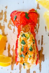 The Best Easy Broiled Lobster Tails Recipe - The best tender, juicy, delicious easy broiled lobster tails recipe - bursting with lemon, butter, and a hint of paprika in just 10 minutes! #thebestbroiledlobstertailsrecipeever #maindishes #popular