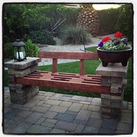 Bench made out of left-over patio pavers and a few 2x4's!