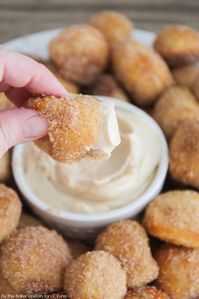 Cinnamon Sugar Pretzel Bites - Auntie Anne's copycat recipe. These things are AMAZING!! Super soft on the inside and full of cinnamon, sugar flavor with a yummy dip made with powdered sugar, vanilla, butter, and maple extract!