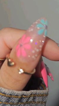 Short Nail with sparkly pink and light Blue colour flower design