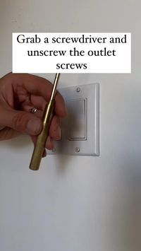 How to install wallpaper around outlets - it’s easier than you think! 1. Remove outlet cover with a screwdriver. 🪛 2. Loosely drape your wallpaper over the outlet. 3. Grab a pencil and roughly trace around the edge of the outlet. ✏️ 4. Carefully cut around your pencil markings. 5. Lastly lift up your wallpaper and reapply firmly, before using squeegee to smooth it out. 6. Reinstall cover and you’re done! 🎉