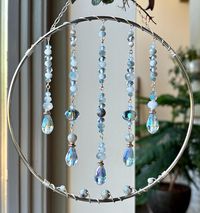 Suncatcher - Mother of Pearl, glass, and metal beads - silver *Height includes hanger, width is at it's widest point