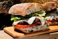 Double-decker marinated portobello burger (lacto-ovo vegetarian)