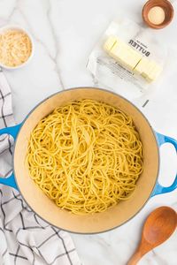 Buttered Noodles are an easy recipe with only four ingredients that everyone always loves! Toss noodles with Parmesan cheese, garlic powder and butter. Perfect for fussy eaters and when you want a simple lunch or dinner.