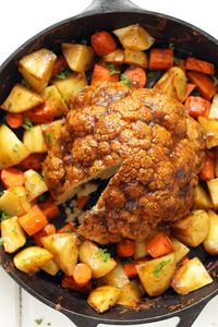 Whole Roasted Cauliflower - pot roast, vegan style! Tons of savory flavor, perfect for a holiday like Thanksgiving or a big family dinner. #karissasvegankitchen #veganrecipes #cauliflowerrecipes #cleaneating #vegetarianrecipes #vegandinner