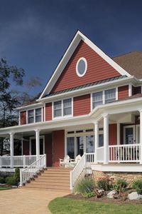 This house features the 3rd-generation version of CertainTeed's redesigned Cedar Impressions Double 7" Staggered Perfection Shingles in autumn red