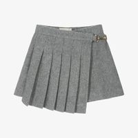 Smart grey skort for girls by luxury Italian fashion house, Fendi. Made in a beautifully soft wool-blend flannel, it fastens with a zip, hook and button, and has a stylish pleated flap that secures with a gold-tone branded clip. The skort is lined in silky viscose and has useful concealed side pockets, and welt pockets on the back.