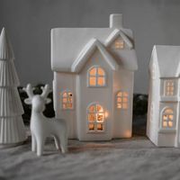 What a great, classy and very special decoration! The Byn house series is handcrafted from open-pored ceramic and consists of a total of 12 different buildings - you can find them all in our shop, but only while stocks last. Due to the nature of the material and to avoid sooting, we recommend the use of electric lights inside this house. This item is handmade from open-pored ceramic and may therefore have slight variations. You will receive a candle house as described, other decorations and cand