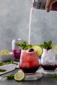 Sparkling Cherry Lime Mocktail! This crisp and refreshing, low-calorie, mocktail features sweet, tart cherries, cherry juice, fresh lime juice and sparkling water. And, it tastes absolutely delicious. | #cherrylime #mocktail #drinkrecipes #spindrift #mocktailrecipes #sparklingwater alifedelicious.com via @alifedelish