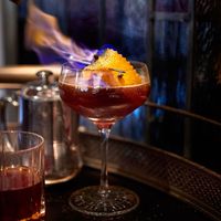 How to Set Your Cocktails On Fire At Home Without Causing Chaos