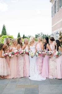 Bridesmaids in pink assorted dresses at the Miramont Country Club in Bryan, Texas.