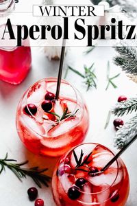 This Cranberry Aperol Spritz is perfect for fall or winter. With a hint of cranberries, bubbly prosecco and the delicious flavor of aperol, now spritzes aren't just for the summer. // recipe how to make // holiday