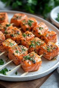 Satisfy your cravings with these flavorful, crispy air fryer salmon bites. Enjoy them on their own as a healthy snack or create a delicious bowl featuring these Asian-inspired bites. Try different variations like teriyaki, honey garlic, or keto-friendly options to suit your taste preferences. Quick to make and packed with protein and nutrients, these air fryer salmon bites are a must-try for seafood lovers looking for a guilt-free indulgence.