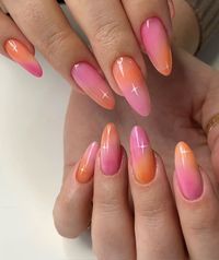 Pink and orange is one of the trendiest color combo of 2023-2024. Fun gradient nail art with white stars, hand drawn nailndesigns.