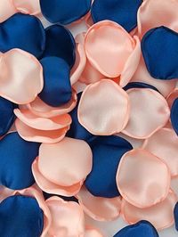 Enhance the romantic ambiance of your wedding with these stunning navy blue and peach rose petals. Perfect for a peach wedding theme or adding a pop of color to a deep navy blue color scheme, these gorgeous petals will elevate your decor effortlessly. Scatter these peach rose petals on tables, aisles, or walkways to create a magical atmosphere at your special event. Whether you're planning a peach wedding or incorporating deep blue wedding decor, these navy blue flower petals are versatile and b