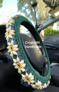 Handmade crocheted wheel cover which is made like accessories for car* Crochet steering wheel cover is a great way to update your car's interior with good quality. The cover grip from pure cotton has a comfortable feel and will protect your hands from hot or cold steering wheels. It fits a standard 46.5"-47" circumference or 14.5"-15" in diameter (35.5-39.5 cm -measurements 1 on the photo) steering wheel It fits well on sedans, hatchbacks, wagons, SUV and other cars. Composition: 100% cotton, me