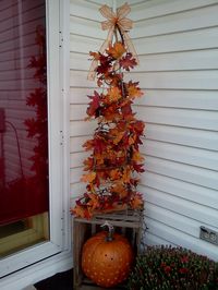 Tomato cage tree. Can change from Halloween to fall to Christmas