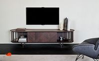 It changes the height of the feet, its line is modern rectangular with circular ends, it is Costes TV, the service complement for the TV screen. This TV cabinet is made of hardwood with inserts, painted steel base and interior glass shelves. The Costes TV stand is designed by Cattelan.