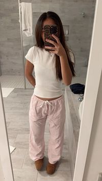 Top and bottoms from brandy melville, pink linen striped pants, shoes are ugg, coquette, aesthetic, fall fit, winter outfit inspo, clothing inspiration, fashion, cute