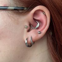 16G F-136 Titanium Moon man Daith Clicker, Hinged Septum Ring, Steel Septum Jewelry, Daith Hoop, Daith Earring 1.2*8/10mm  Material: The jewelry is crafted from ASTM F136 Titanium, making it hypoallergenic, lead-free, and nickel-free, ensuring maximum safety. Size: Bar thickness: 16g(1.2mm), Inner diameter: 8mm, 10mm. Color Options: Silver, Gold Package:  Sold Individually Multiple Usage: Can be used as a Nose Ring, Helix Hoop, Daith Earring, Conch Earring, Cartilage Hoop, Earlobe, Belly Button