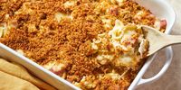 This chicken Cordon Bleu casserole features cooked chicken, ham, and noodles baked in a light and creamy sauce topped with cheesy bread crumbs.