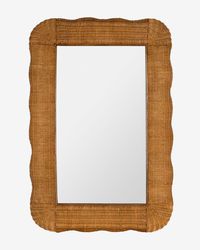 Designed with a subtly scalloped frame of woven, natural rattan, the Kinley Wall Mirror is a charming piece of wall decor. Its rectangular shape and smartly positioned wall hangers allow it to be hung either vertically or horizontally, or it can be layered for a sweet touch of natural material on dressers or mantels.