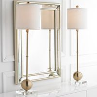 An appealing blend of glam finishes, sparkling clear crystal and off white linen combine for a timeless modern buffet lamp with understated elegance. The slender profile is perfect in pairs on a dining buffet, console or foyer table.