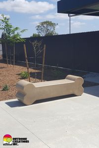 Concrete dog bone bench.  Durable and customizable.