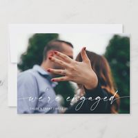 This engagement announcement features the couple's photo to tell friends and family about the recent engagement.