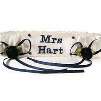 Navy and white satin personalised embroidered wedding garter with pretty little roses. £27.99