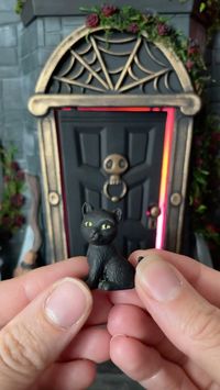 Every haunted house needs a black cat! 🐈‍⬛ I grabbed these little guys in a two pack from the @dollartree and used some acrylic paint to paint them black! For a finishing touch I gave them yellow eyes. Share this with a friend and 🐈‍⬛❤️ FOLLOW me, @probablycoveredinpaint for more Haunter Dollhouse makeover DIYs!