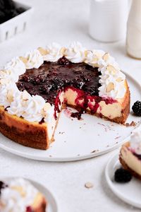 Blackberry almond cheesecake makes the BEST summer dessert! You'll love this classic cheesecake with an almond crust and blackberry topping!