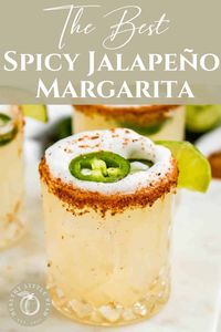 This easy spicy margarita recipe combines orange juice, freshly squeezed lime, & jalapeño slices with Blanco tequila served over ice with a Tajin seasoned rim & egg-white foamy finish. #cocktails #margarita #jalapenomargarita #drinks #happyhour #skinnycocktails