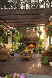 Such a relaxing #backyard with an amazing brick fire place. #outdoorlivinginspiration #outdoorlivingideas #backyard #fireplace