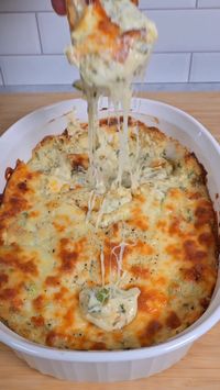 by @bbqfriend  𝑰𝒏𝒈𝒓𝒆𝒅𝒊𝒆𝒏𝒕𝒔: • 3 Heads of Garlic • Olive Oil • 1 Block Cream Cheese • 1/2c Mayonnaise • 1 Bag Mozzarella Cheese • 1/2c Shaved Parmesan Cheese • 1/3c Chopped Green Onion • 2T Italian Parsley • 1T Rosemary • Salt and Pepper to Taste  𝑹𝒐𝒂𝒔𝒕𝒆𝒅 𝑮𝒂𝒓𝒍𝒊𝒄: - Chop the tops off the garlic heads - Place on aluminum foil - Top with Olive Oil, Salt and Pepper - Bake 375F for 1hr  𝑹𝒐𝒂𝒔𝒕𝒆𝒅 𝑮𝒂𝒓𝒍𝒊𝒄 𝑫𝒊𝒑 - In a bowl add softened cream cheese - Squeeze out the roasted garlic - Add half a bag of mozzarella cheese - Add the Parmesan, green onions, mayo, parsley and rosemary, salt and pepper to taste - Mix well and add to a baking dish - Top with the rest of the mozzarella cheese - Bake 375F for 20min till cheese is melted