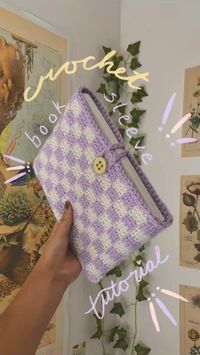 Hey friends! Lately I’ve been obsessed with the checkerboard look and mock knit stitches, so I decided to merge the two and create this book sleeve. Now that Pinterest has idea pins, I’ve created a full tutorial with photos, videos, and descriptions (down below) ;P  —————————  📝Supplies:  • 4 weight yarn in the colors of your choice  • 5.5 mm hook (5mm also works)  • Sewing needle and thread  • Button  ⭐️Slide 2:  • Chain the length of your desired book. But, we’re gonna do a little math first ;). Because each checkerboard square is 3x3 stitches, the number of stitches we’ll make around the chain has to be divisible by 3. Plug the number of chains into the equation [(X-1) * 2] + 5 and see whether or not the resulting number is divisible by 3. Adjust the number of chains you have accord