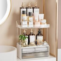 Enhance your daily beauty routine with the elegant and chic Delamu 2-tier Vanity Organizer. Designed specifically for those who cherish an organized and stylish bathroom countertop, this counter top organizer features two beautiful clear white drawers, adding a touch of warmth and luxury to your space. Made from high-quality acrylic, DELAMU bathroom makeup organizer is both durable and clear, allowing you to easily view and access your cosmetics and toiletries. Transform and declutter your bathr