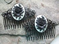 "Beautiful black rose cameo hair combs. The cameo is amazingly detailed. The black filigree hair comb is very pretty and about 3\" long. I have an enormous selection of cameos you can choose from for a custom order, so please do browse my shop, and feel free to message me. I have a wide selection of lockets, brooches, formal gloves, chokers, barrettes, necklaces, bracelets earrings, rings and matching sets. I can make a complete set, comb or barrette, necklace and or brooch, bracelet and ring, t