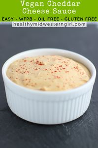 A creamy, tangy cheddar sauce that's TO DIE FOR! Just 5 minutes. #healthymidwesterngirl #vegancheddarcheeserecipe #wfpbcheesesauce #vegancheesesauce #dairyfreecheese