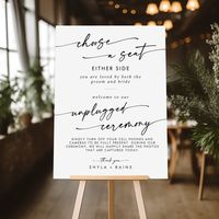 This boho black and white seat unplugged ceremony sign is perfect for a minimalist wedding. The black and white modern bohemian design features simple rustic calligraphy with a unique yet classic style. Perfect for any season: spring, summer, fall autumn or winter.  This foam board sign combines your choose a seat sign, with your unplugged ceremony sign. The sign reads: choose a seat either side you are loved by both the groom and bride. Welcome to our unplugged ceremony kindly turn off your cell phones and cameras to be fully present during our ceremony. We will happily share the photos that are captured today. Thank you.  Personalize the sign with your names.