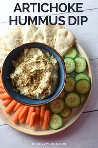 Super smooth and delicious without losing the flavor of the artichokes, this artichoke hummus is vegan, gluten free, and will be a major hit at your next party! #artichokehummus #dip #hummus #partydip