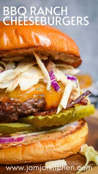 These BBQ Ranch Burgers take a classic cheeseburger to a whole other level! Quality ground beef infused with ranch flavor, basted in BBQ sauce and then topped with melted cheddar, BBQ ranch coleslaw and a delicious burger sauce you're sure to make again and again!