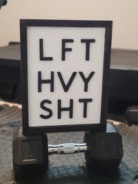 "Give yourself a little extra push to one more rep with this modern home gym decor. This 3D Wooden sign is available in two colors: white background with black letters and a black frame or black background and frame with white letters. This would make a great gift for a weightlifting enthusiast Dimensions: 10.5\" wide, 13\" tall, 1.5\" deep A portion of the proceeds from this item will be donated to efforts to acquire an adaptive running chair for a disabled runner. Welcome to my shop! I make al