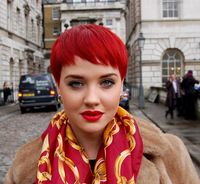 go shorter...she's darling and shout out for the red lips and scarf!!!<3