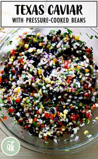 Low-sugar Texas Caviar! Traditional Texas Caviar relies on a ton of sugar, but it's not necessary: peppers, onions, and corn all provide plenty of sweetness. This recipe uses both black eyed peas and black beans, cooked in a pressure cooker, and goes big on the acid, calling for both vinegar and fresh lime juice. It's completely delicious over scrambled eggs, tucked into burritos, and, of course, piled atop tortilla chips. #texas #caviar #lowsugar #corn #blackbeans #blackeyedpeas #pressurecooker