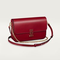 Cartier - Small model chain bag, C de Cartier - Bag Woman Leather - Small model chain bag in cherry red calfskin, golden and cherry red enamel-finish clasp, golden embossed “Cartier” signature inside. One interior compartment, one zipped pocket, one flat pocket and one signature pocket with removable mirror. One pocket on the back. Lining: black lambskin. Dimensions: 150 mm high x 240 mm wide x 50 mm deep. Shoulder and cross-body carry.