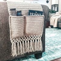 Handmade Sofa Cozy Caddy, Crocheted By Me. This Organizer Is Perfect To Drape Over The Arm Of The Couch To Hold Remotes, Books, Snacks, Eye Glasses, Etc.! It Can Also Be Used On The Bedside By Tucking Between The Mattress And Box Spring. Measures Approximately 41.5" Long. Features Two Pockets (8" X 5" & 8" X 7.5") And A Pretty Lattice Fringe Design On The Outer Edge. 100% Acrylic. Brand New, Never Used Aside From Modeling Photos. #000962 F1