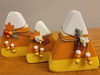 This sweet set of candy corn can be arranged right next to each other, near each other or throughout the room. No matter how you display this adorable trio you'll find them to be a sweet little addition to your Halloween and fall decor.