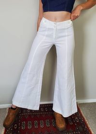 "-Alpaq California brand -bright white color -slightly see-through -very flattering fit -talon zipper   Flaws: a few faint spots near the hem (hardly noticeable) & a slightly loose seam on the crotch - see pics Measurements: waist: 28\" hips: 38\" + some stretch rise: 9.5\" inseam: 31\" Thanks for looking! Please message me with any questions before purchasing."